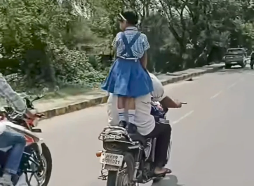 मासूम की जान को जोखिम में डालता पिता,वायरल वीडियो ने मचाया हड़कंप.